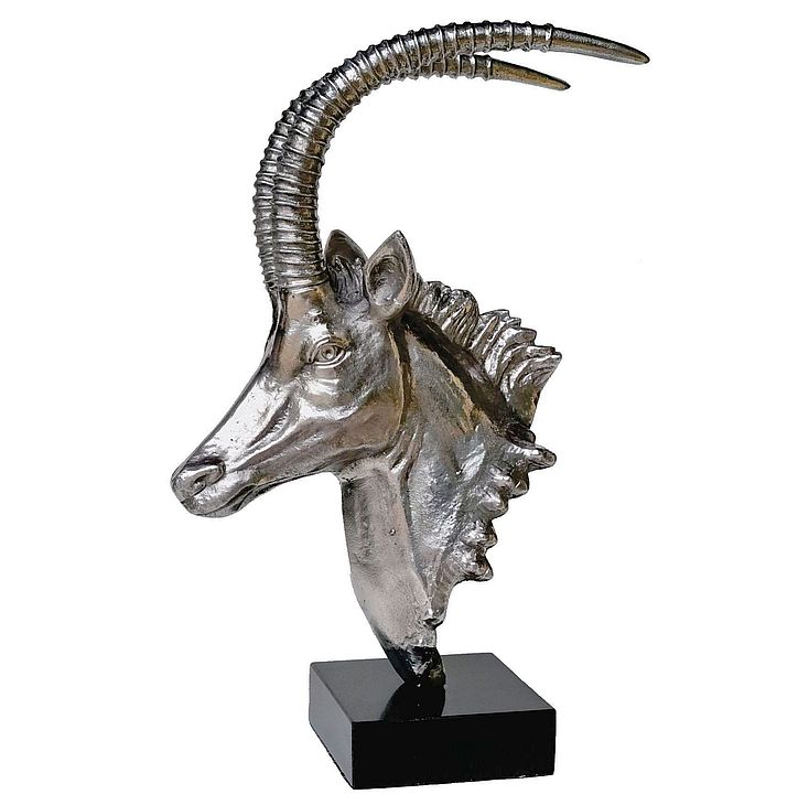 Sable Head sculpture on granite base